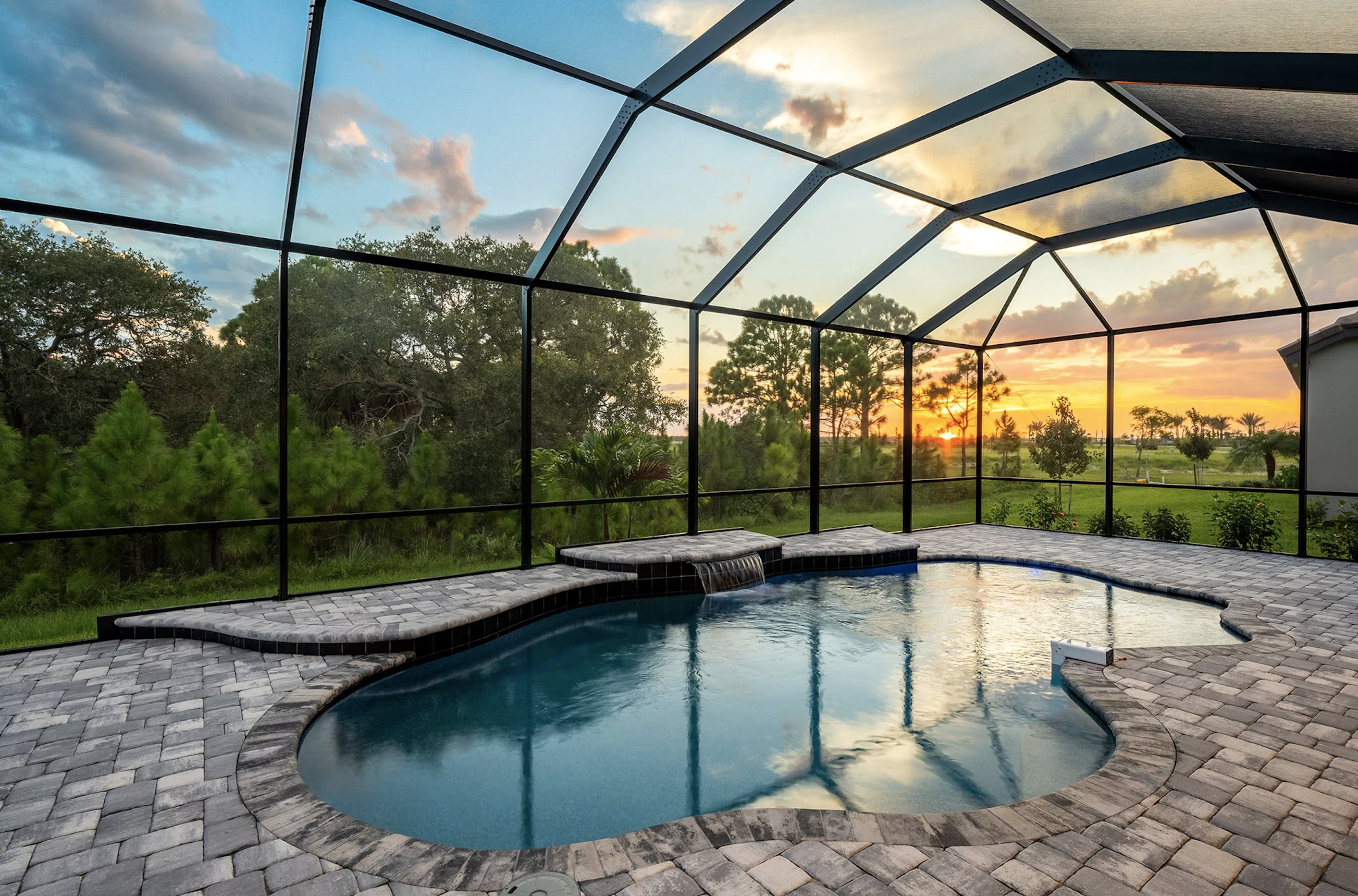 Beautiful residential pool with family enjoying clean water